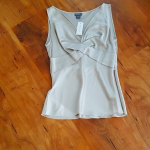 Satin cross from sleeveless blouse